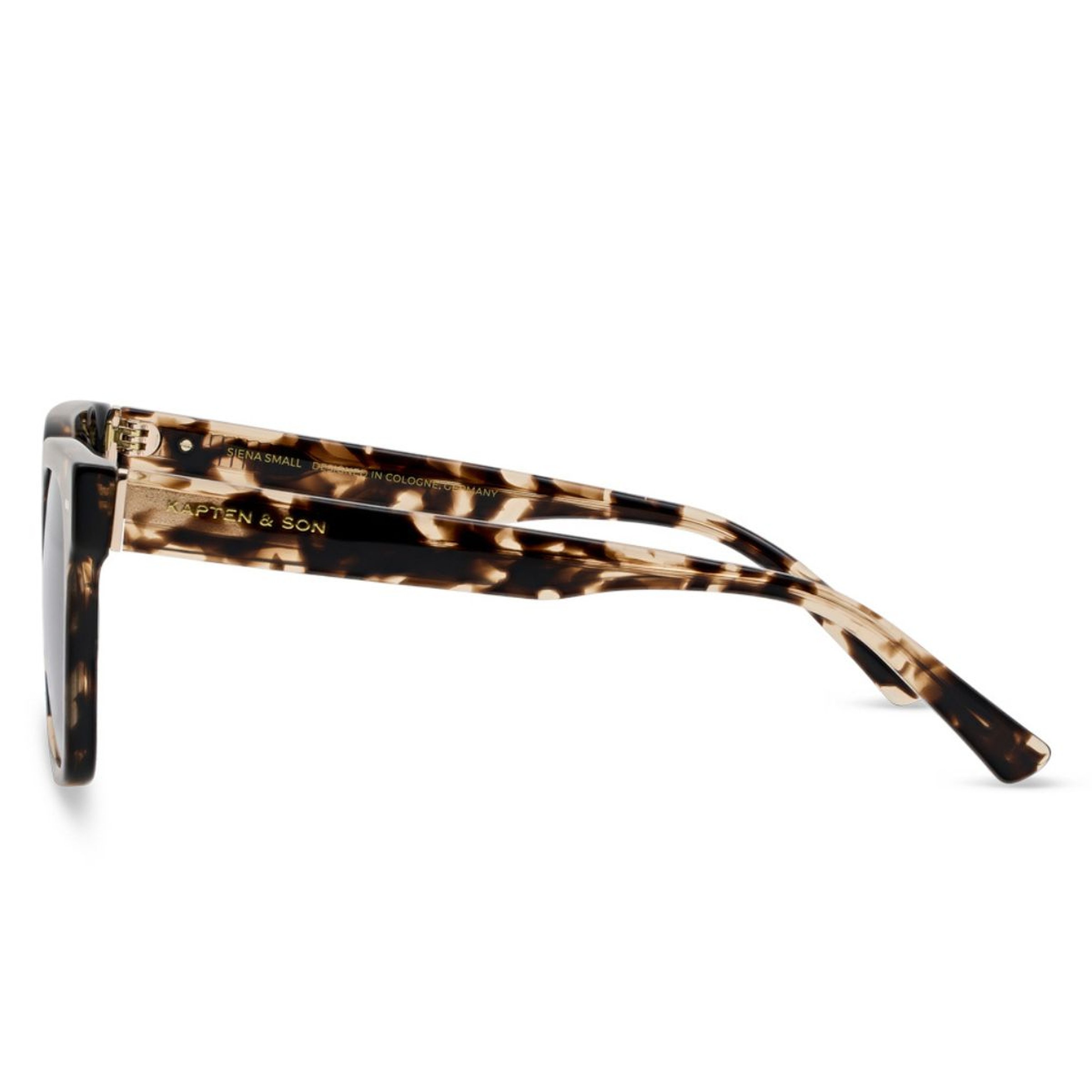 Side view of tortoiseshell sunglasses with "Kapten & Son" logo on the arms. The frame features a sleek design, conveying a modern, stylish tone.