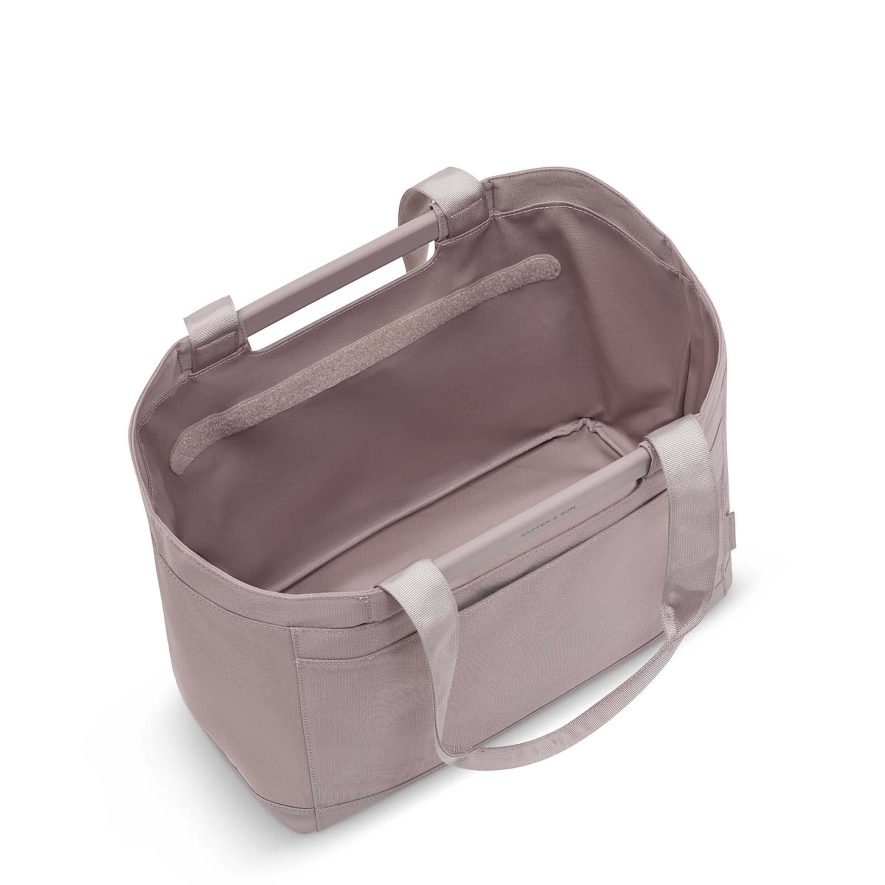 Open boodschappenmand met een ruim interieur en twee handvatten. Het minimalistische ontwerp straalt eenvoud en functionaliteit uit.