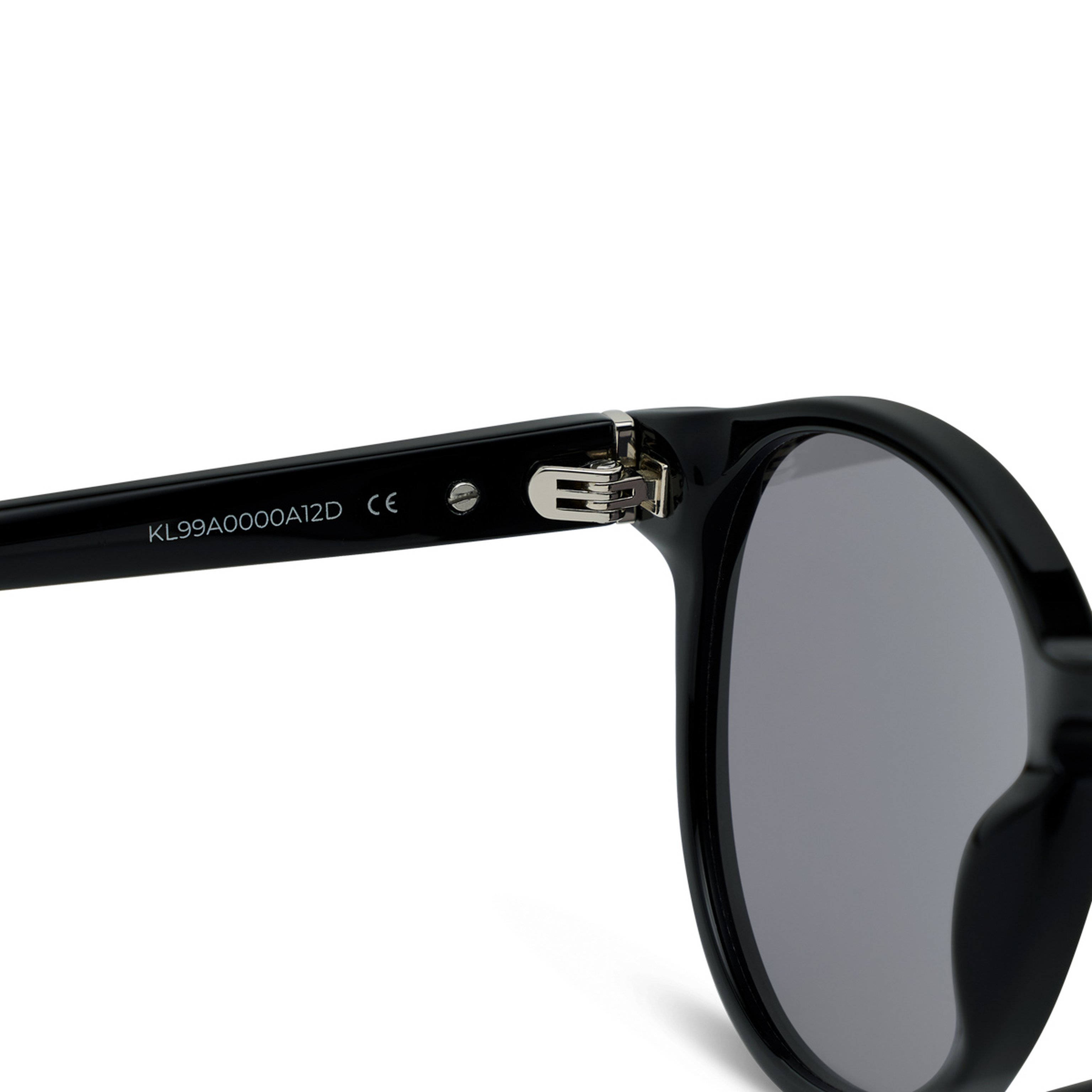 Close-up of black sunglasses with round gray lenses and a visible hinge. The temple displays a serial number and CE marking in white text.