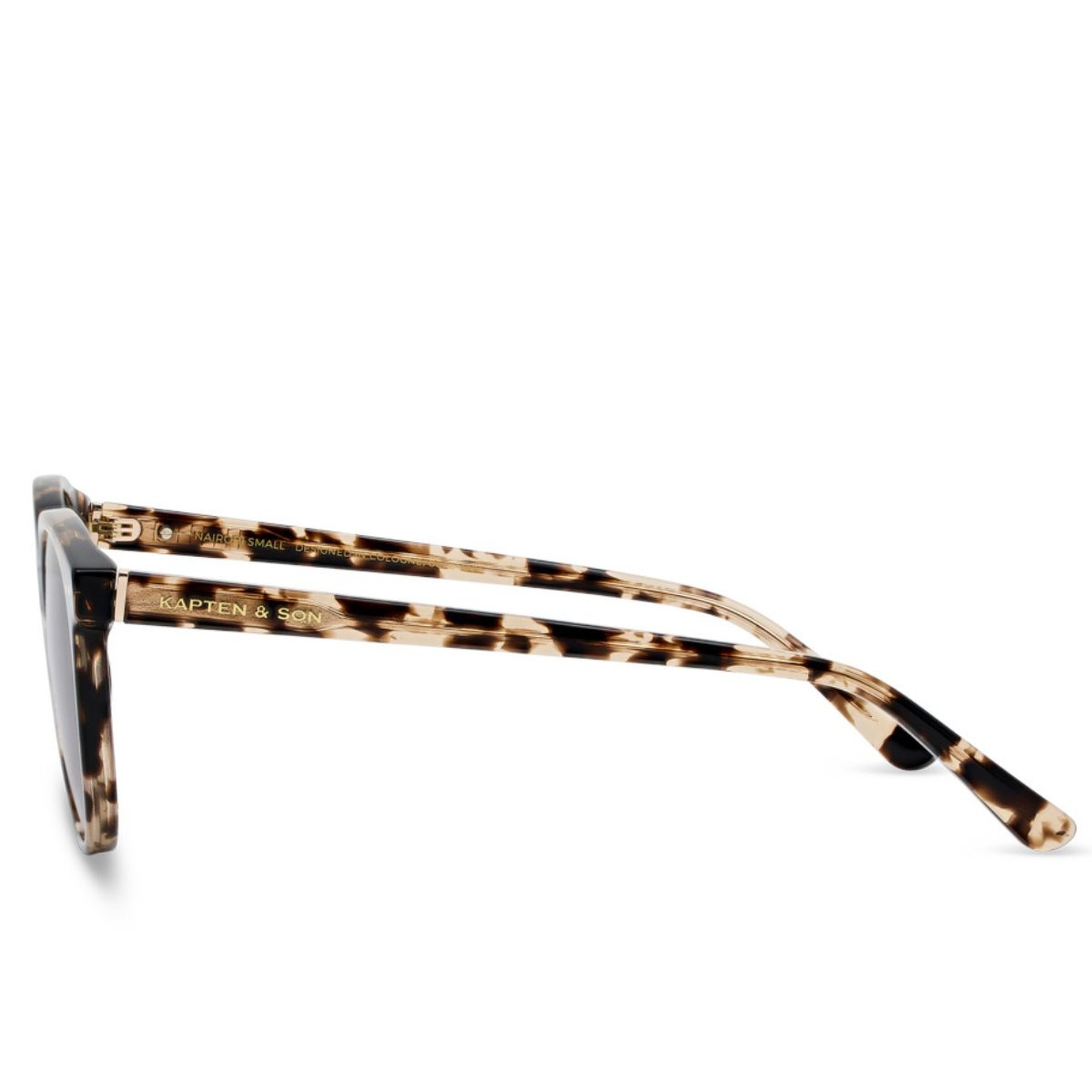 Side view of tortoiseshell sunglasses with "Kapten & Son" logo on the arms. The frame features a sleek design, conveying a modern, stylish tone.