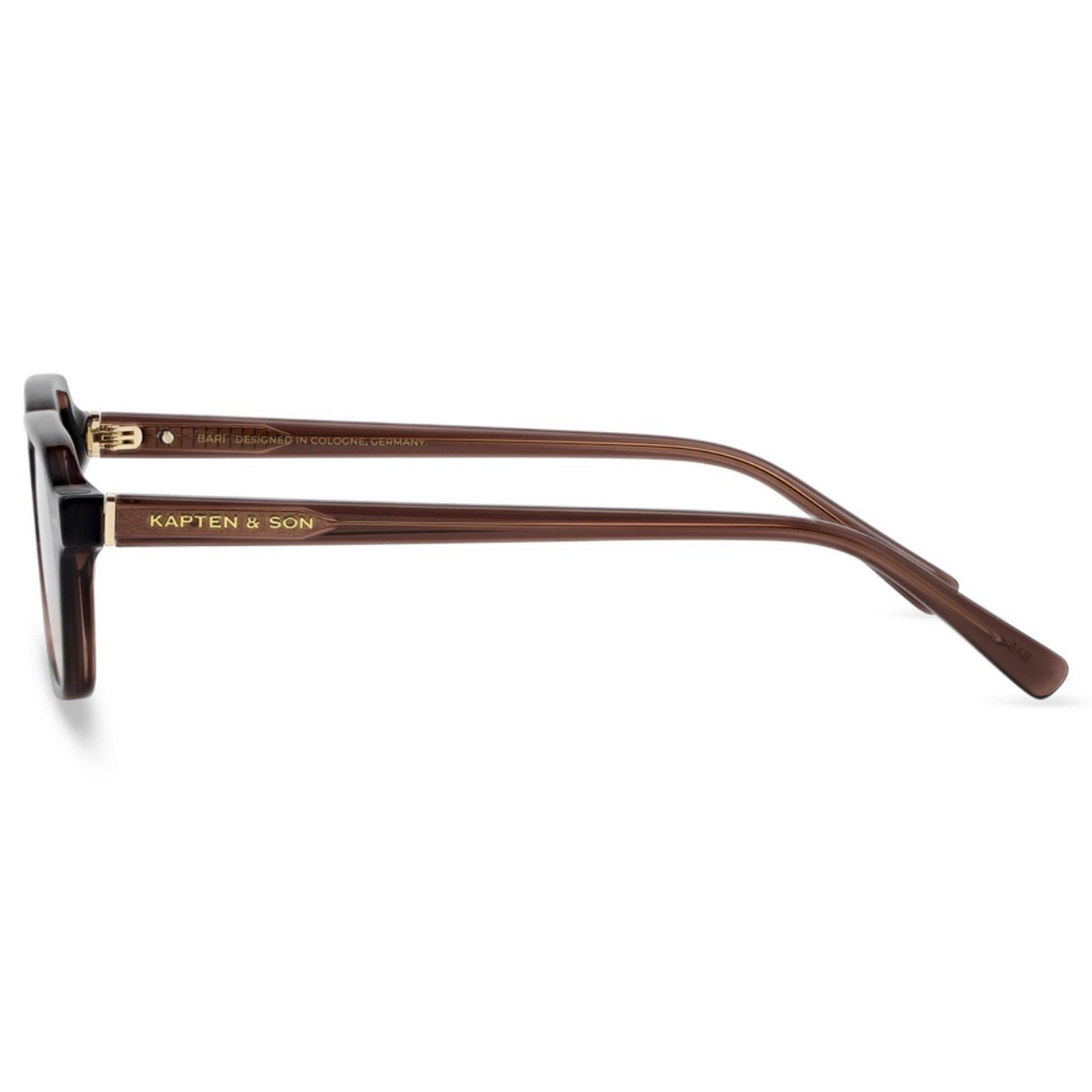 Side view of brown Kapten & Son eyeglasses, showcasing sleek arms with gold branding. The design is minimalistic and elegant, conveying sophistication.