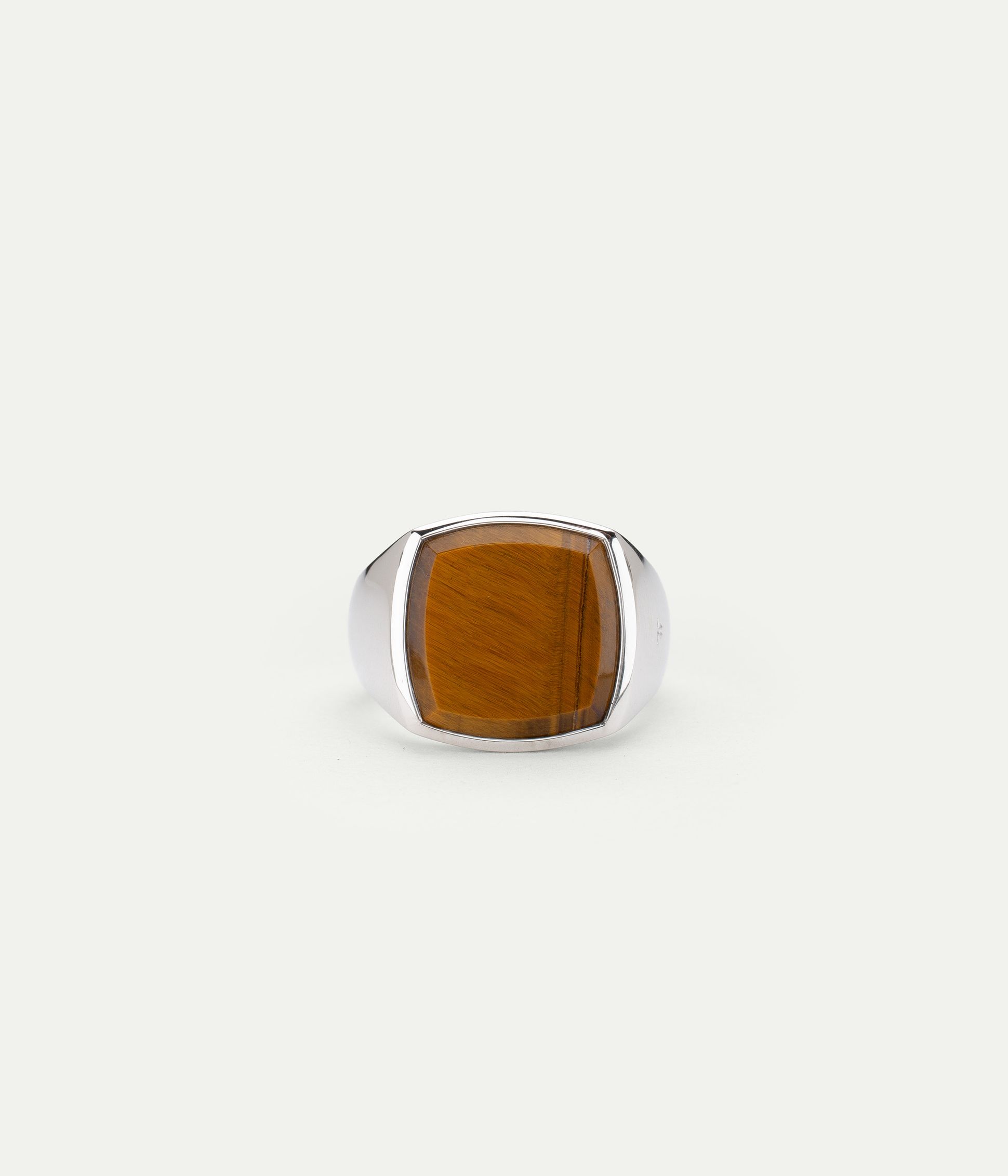 Signet ring in silver set with a polished rectangular tiger’s eye stone