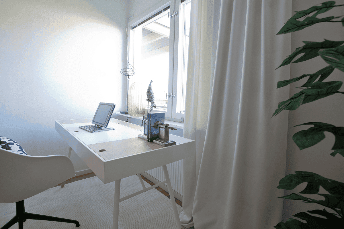 White desk by a window