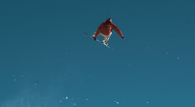 A snowboarder catching some air