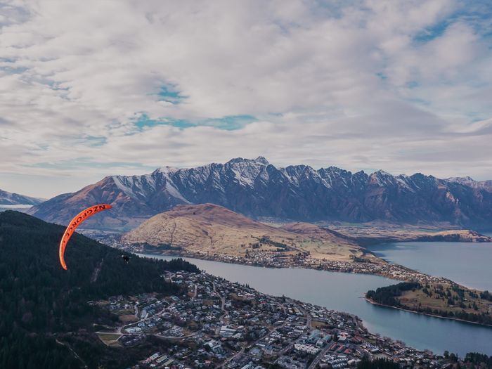 Paragliding with Lake Wakatipu and the Remarkables mountain in the background