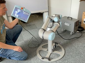 Vom Test bis zur fertigen Cobot-Anlage: Ein Anwender erzählt