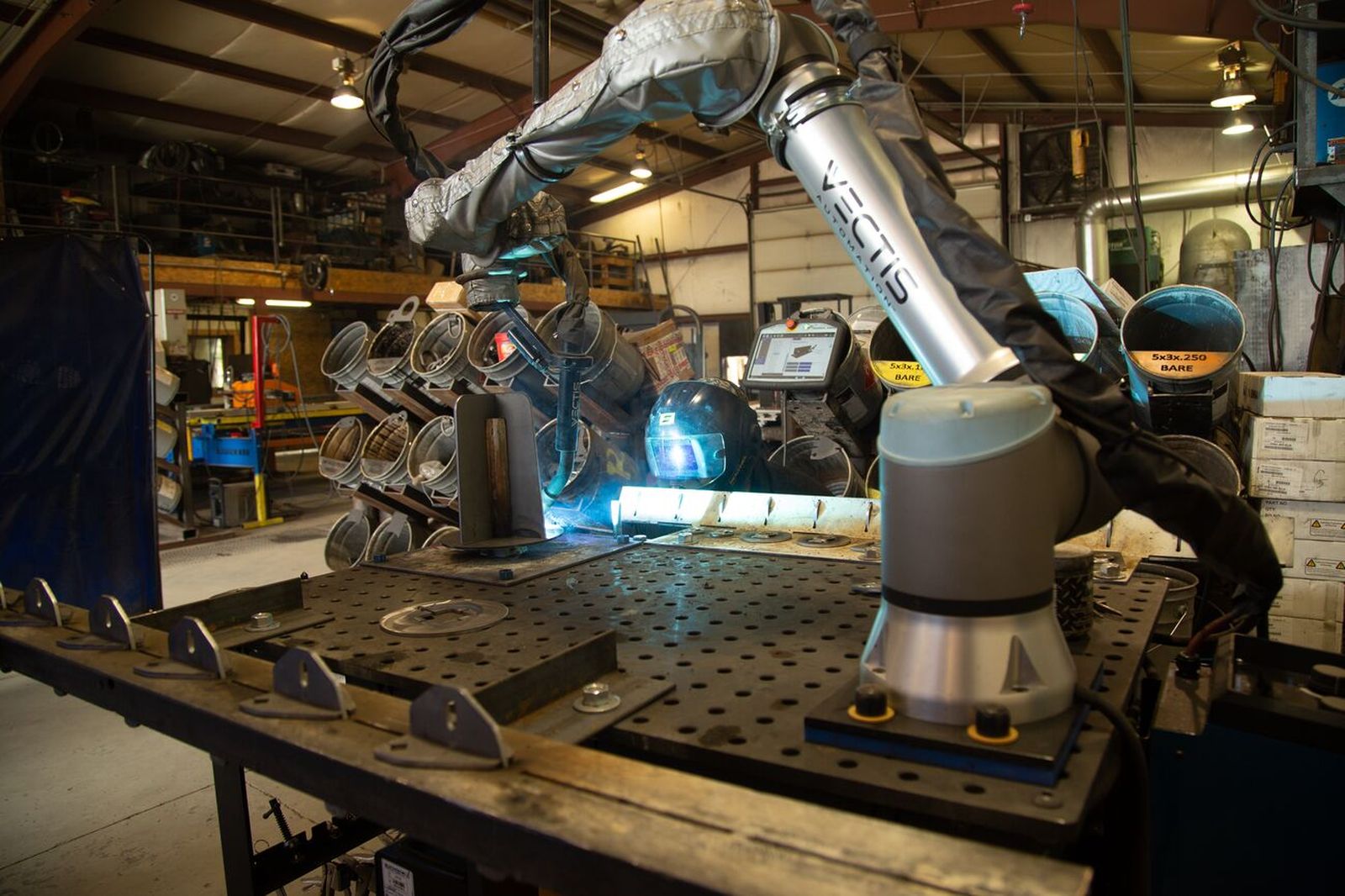 Six-axis collaborative robot performing automated welding