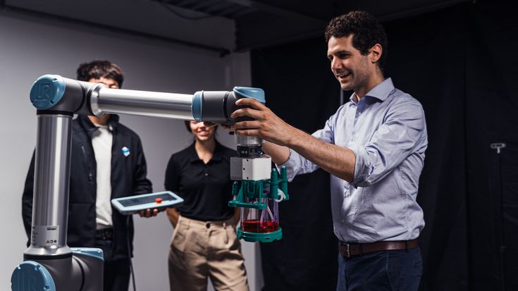 Multiply Labs' solution is a modular robotic cluster featuring multiple Universal Robot arms working in parallel