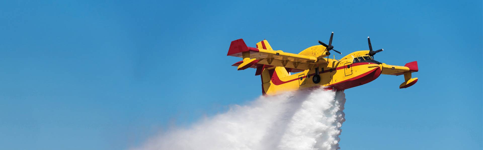 Firefighting plane ejecting water