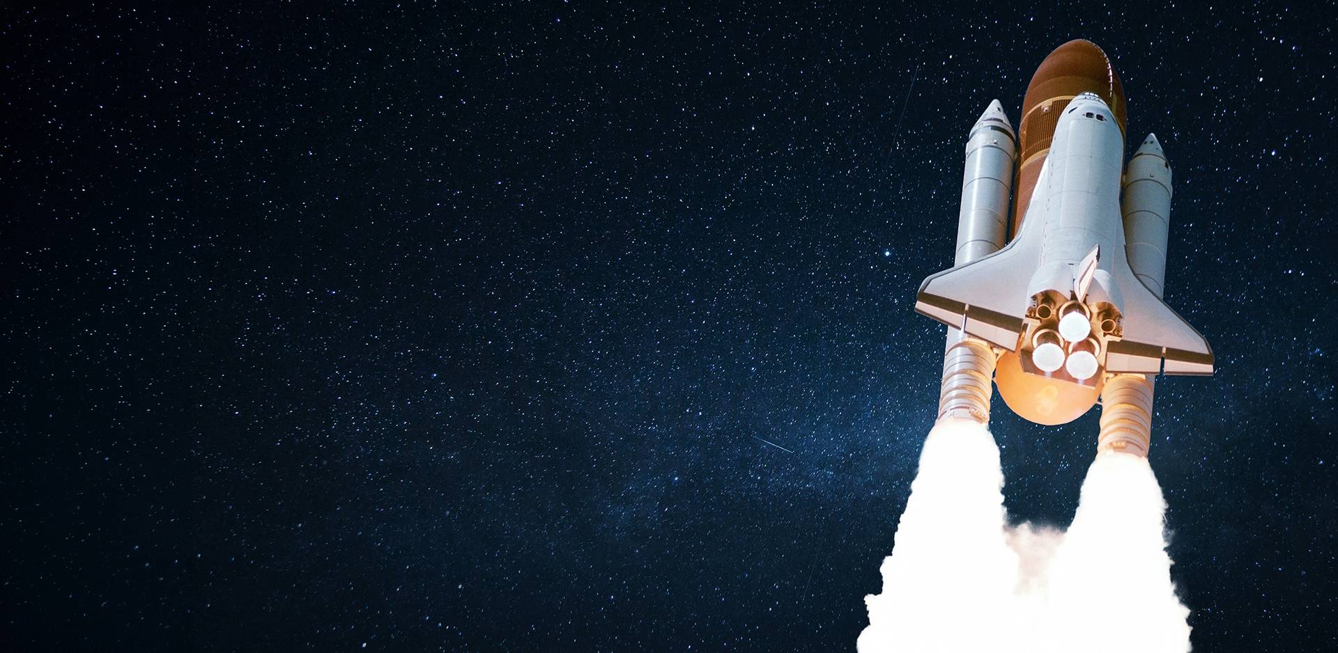 Space shuttle launching against a starry night sky, engines blazing with bright flames and smoke.