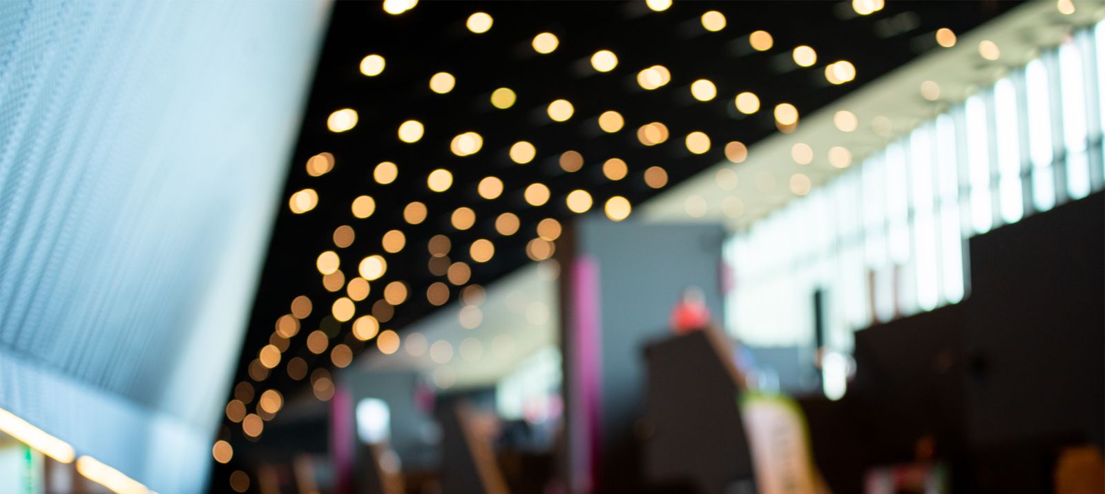 Blurred people in exhibition