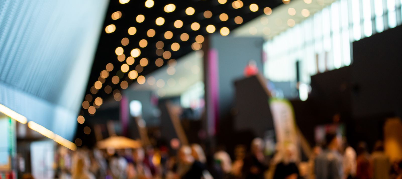 Blurred people in exhibition