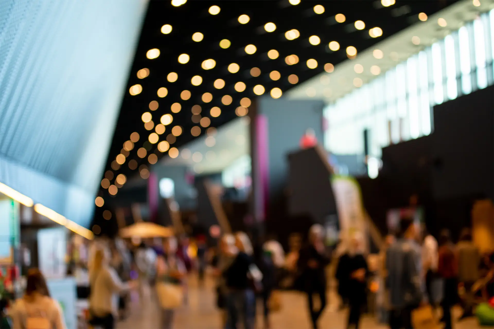 Blurred people in exhibition