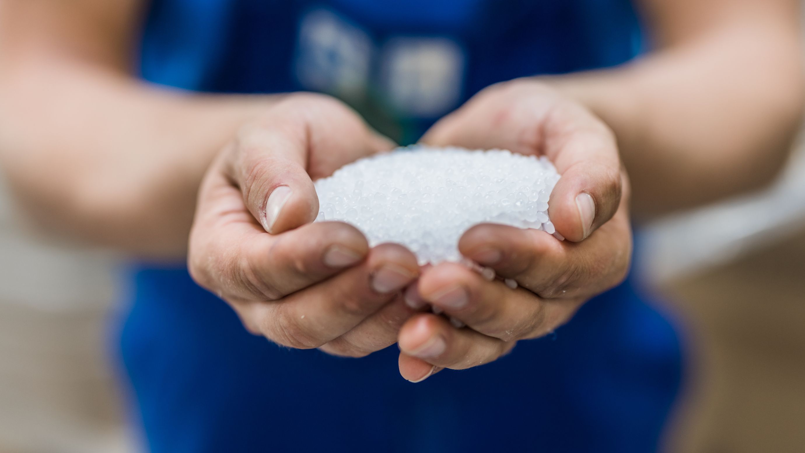 Hands with Plastic granules