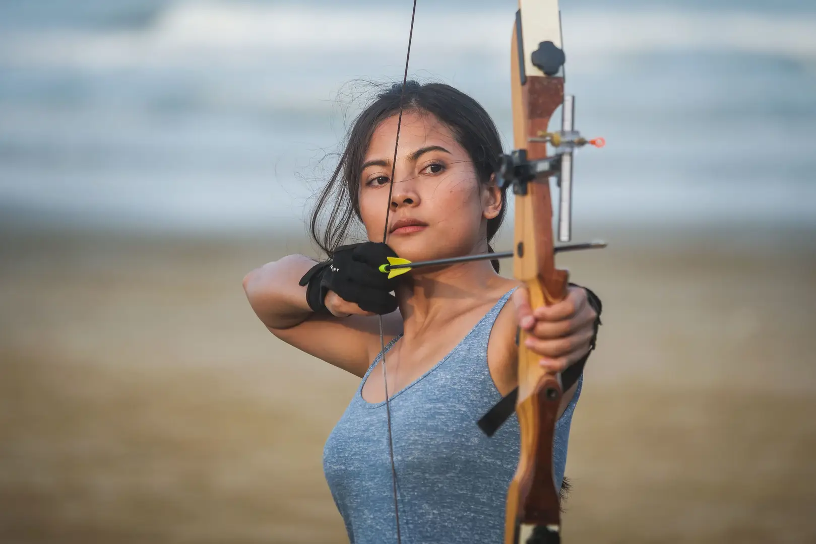 close up of a female archer