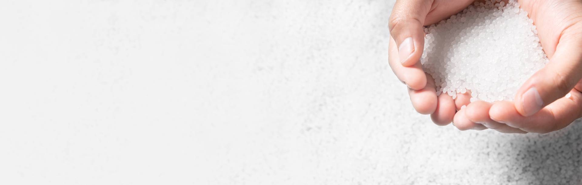 header-Plastic_compound_with_hand