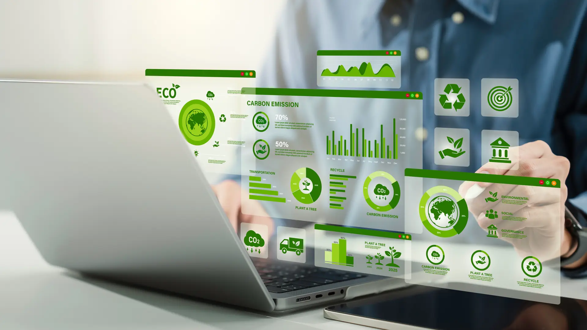 Person using a laptop with green eco-friendly data and graphs displayed in holographic screens above the keyboard.
