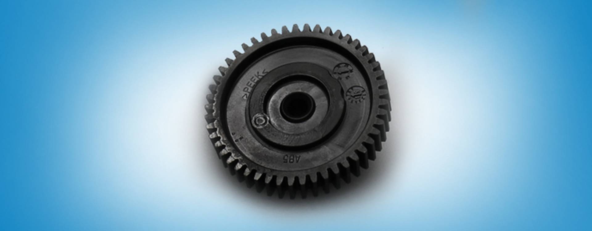 img-textTeaser_Kachel_690x270_Zahnraeder_PEEK