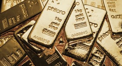 Ein Foto von mehreren 1 kg philoro Goldbarren.