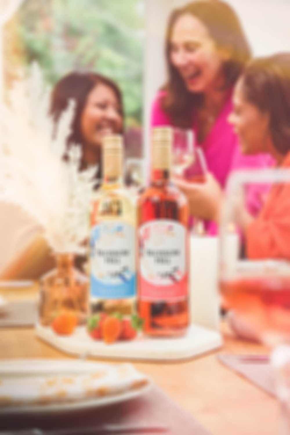 Women at a table enjoying wine