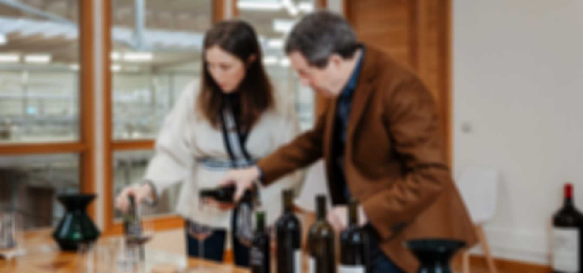 Peter Gago and Caroline Frey pouring wine