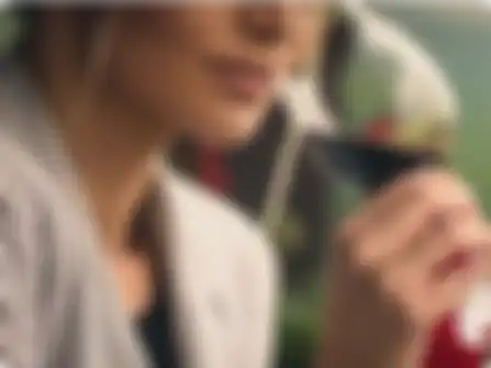 Woman drinking a glass of wine