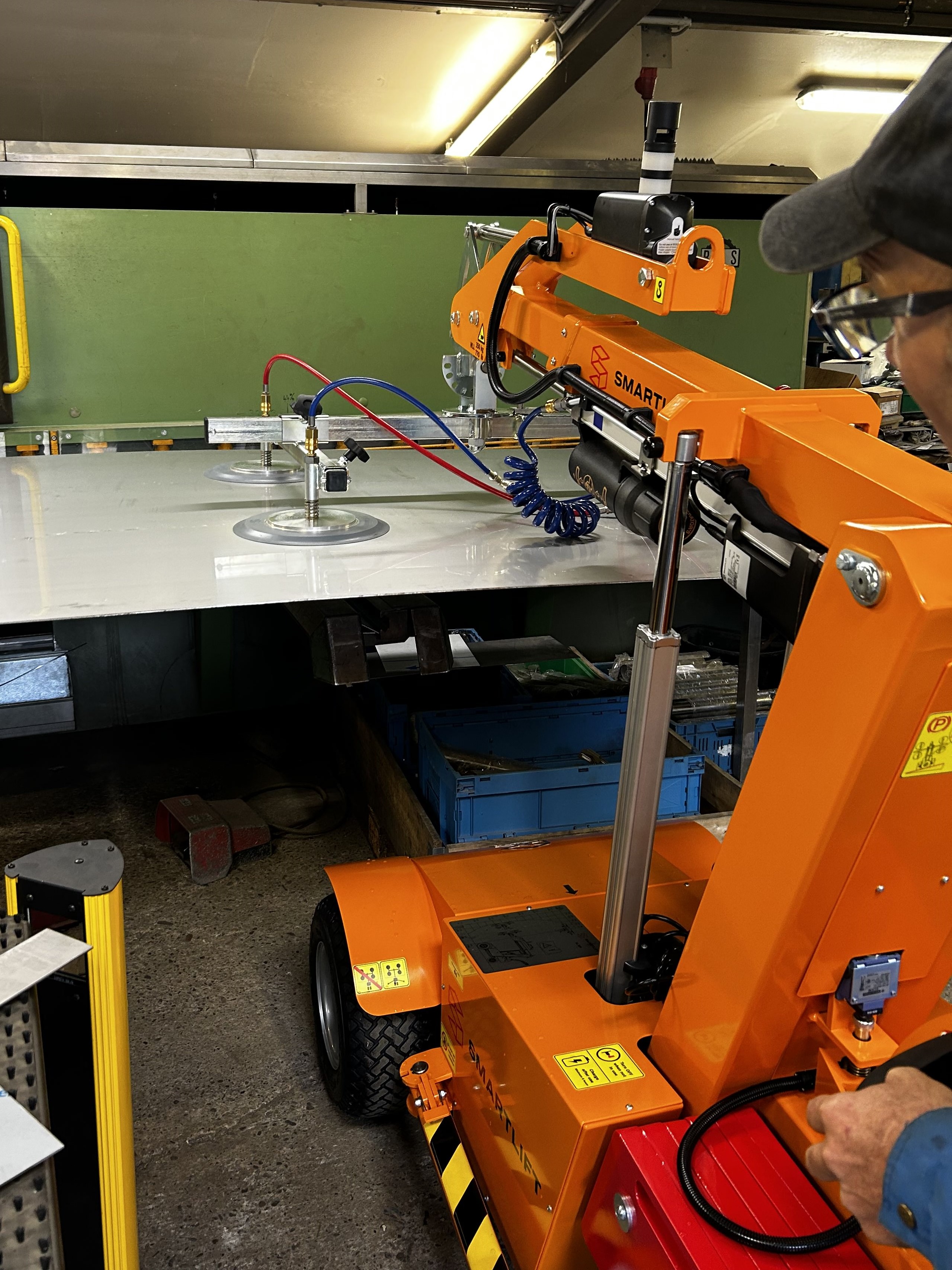 Smartlift vacuum lifter moving sheet metal in a production facility