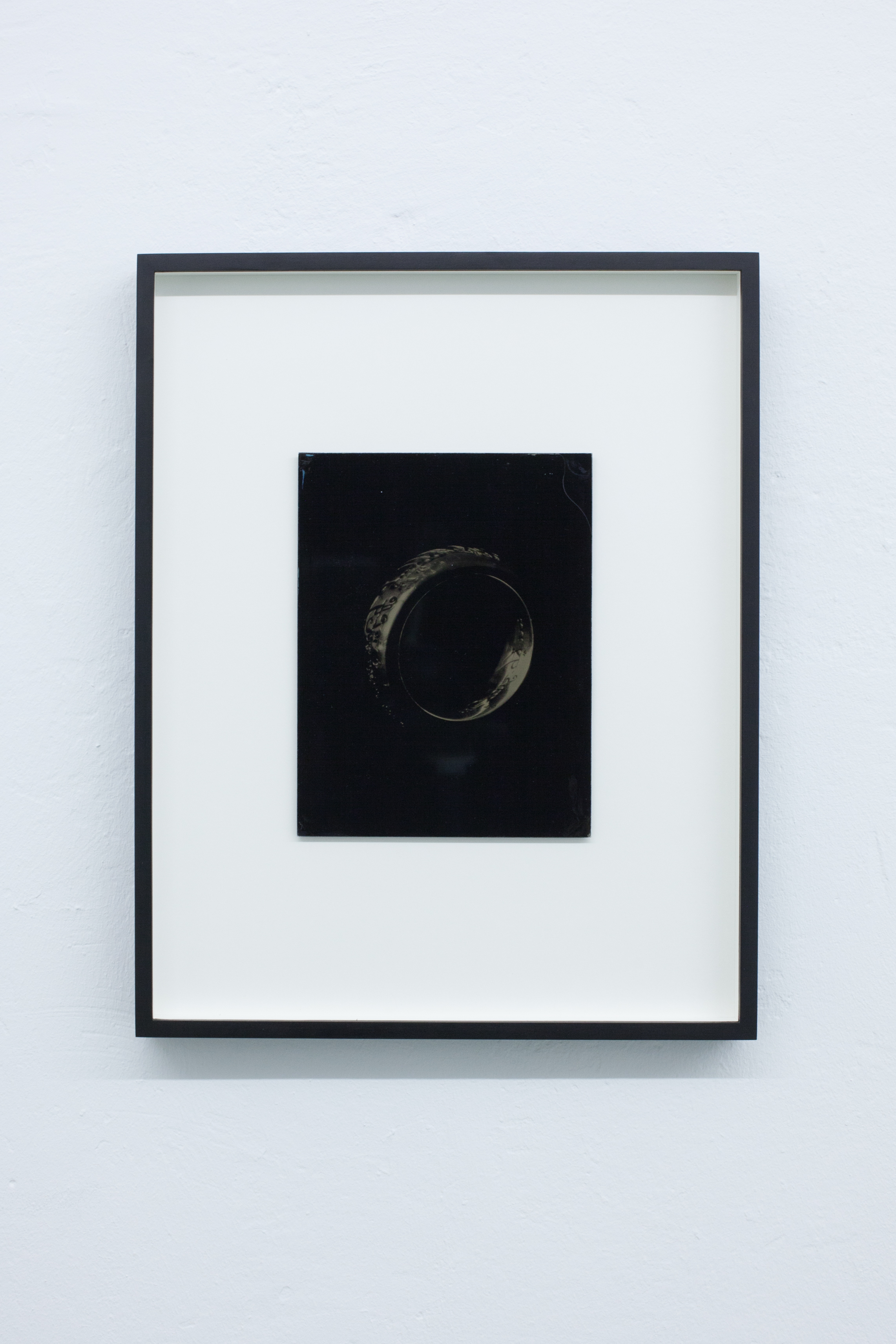 Richard Frater, Not titled, 2017. Ambrotype (collodian positive print on glass); Commissioned souvenir ring with personal engraving by Jens Hansen (official ringmaker for "The Lord of the Rings") constructed from silver residue extract from processed 16mm film