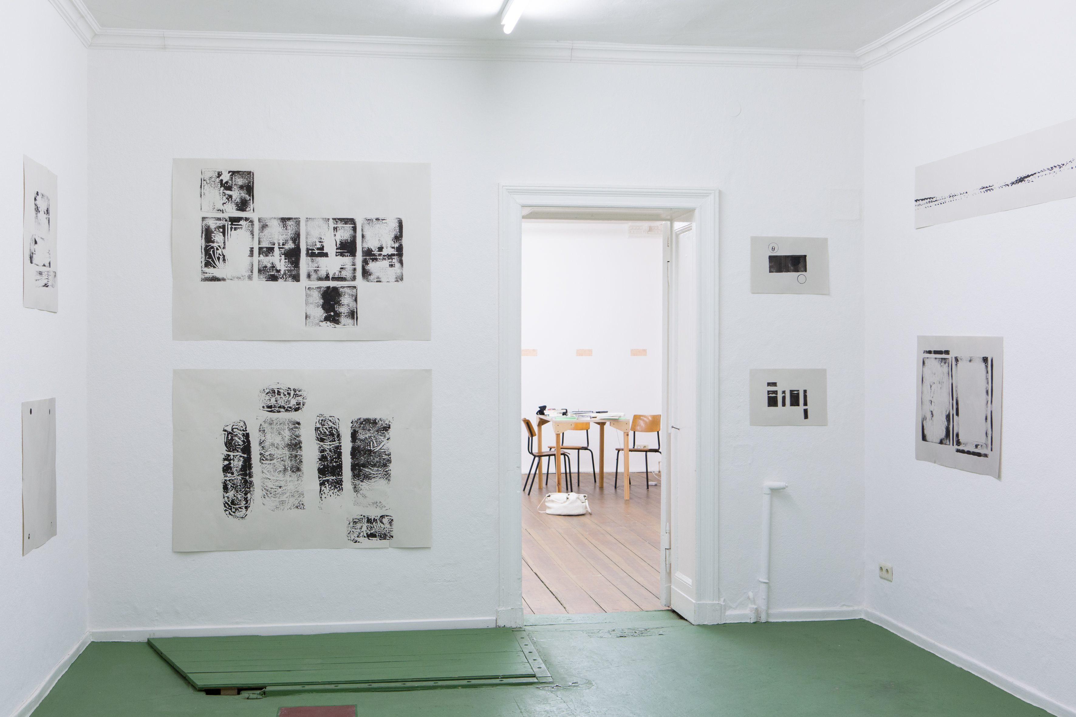 Klara Lidén, Log, Chair, Box, Bag of concrete, Diet Coke, Gauloises, Bike, Canvas, 2013. Spray paint on paper, various sizes. (Photo: Between Bridges)