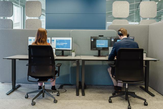 two_people_working_on_computers