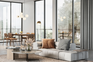 Modern eingerichtetes Wohnzimmer mit großen rahmenlosen Fenstern von Weiß & Weiß