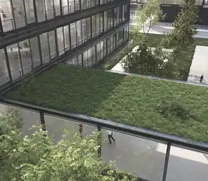 Modernes Bürogebäude mit Kunststoff-Aluminium-Fenstern und begrüntem Dach