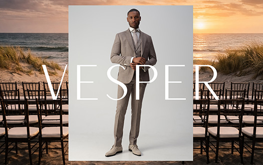 Brandbeeld van het merk vesper: achtergrond is het uitzicht op zee en daarop een grijs vlak waarin een man in pak staat geposeerd