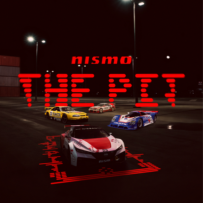 Promotion image of The Nismo Pit, with classic Nissan cars in an empty parking lot