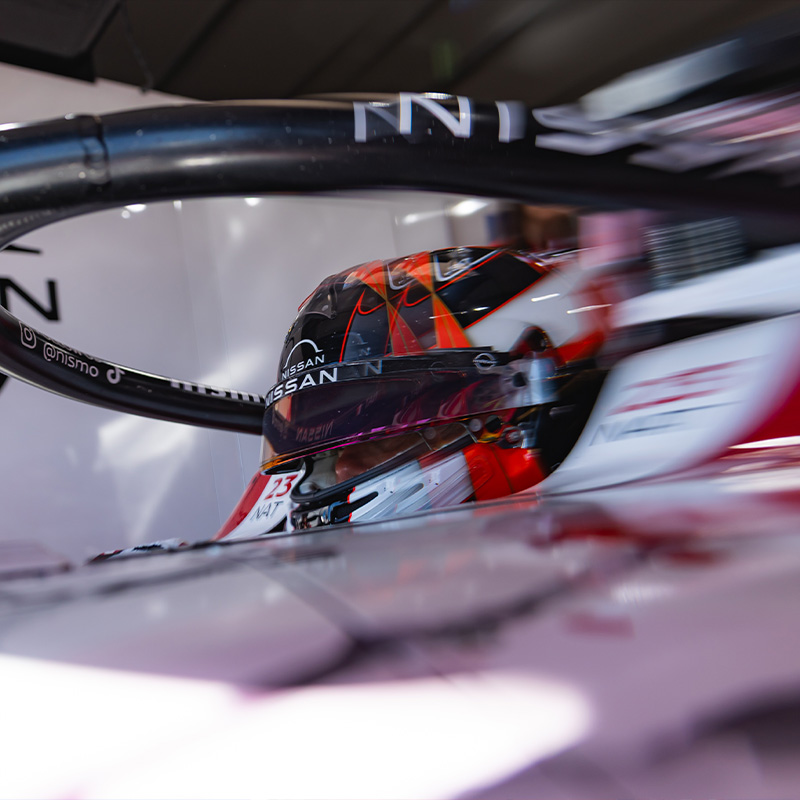 Norman Nato in his car in the garage