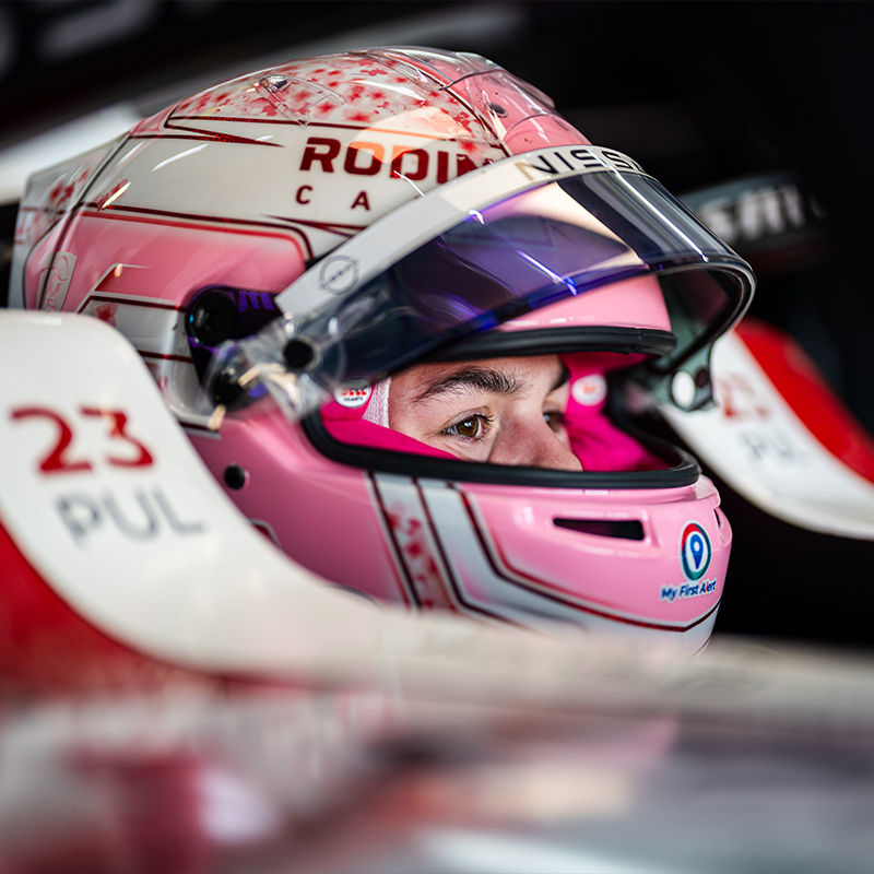 Abbi Pulling sat in the #23 car with her pink helmet on