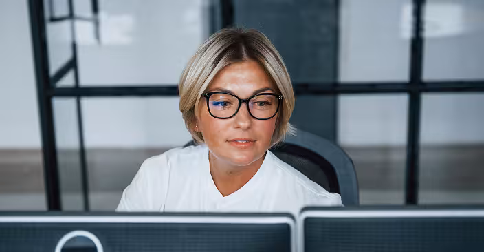 Woman reviewing displays at an office