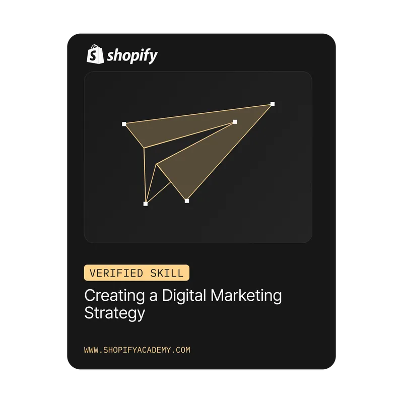 Shopify-Abzeichen mit einem stilisierten Papierflieger und dem Text „Verified Skill: Creating a Digital Marketing Strategy“.