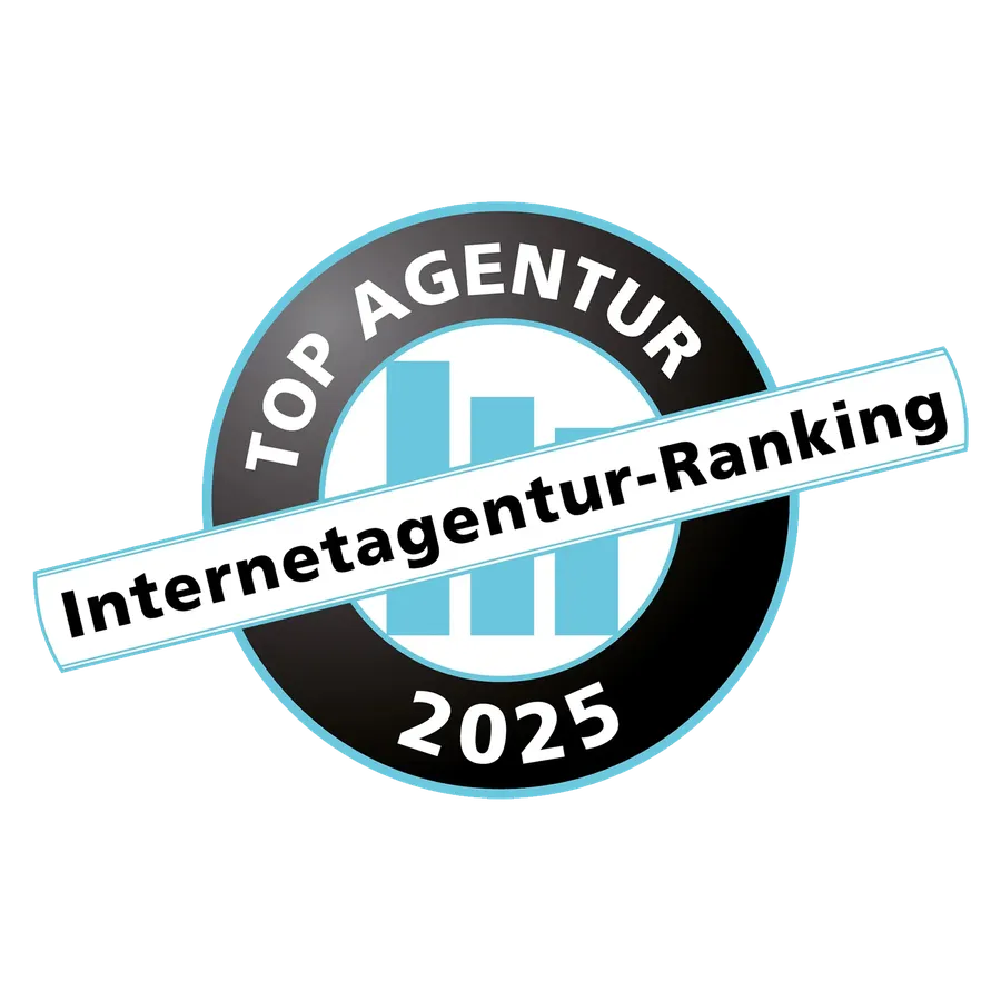 Rundes Logo mit dem Schriftzug „Top Agentur 2025”, einem Balkendiagramm und dem Banner „Internetagentur-Ranking” in der Mitte.