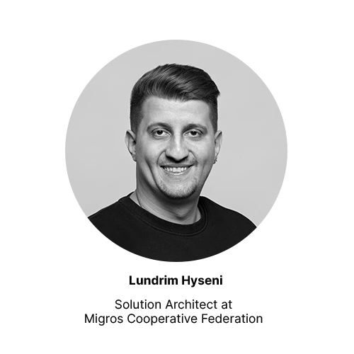 A smiling man with short hair and a goatee in a circular frame. Text below: “Lundrim Hyseni, Solution Architect at the Migros Cooperative Association.”