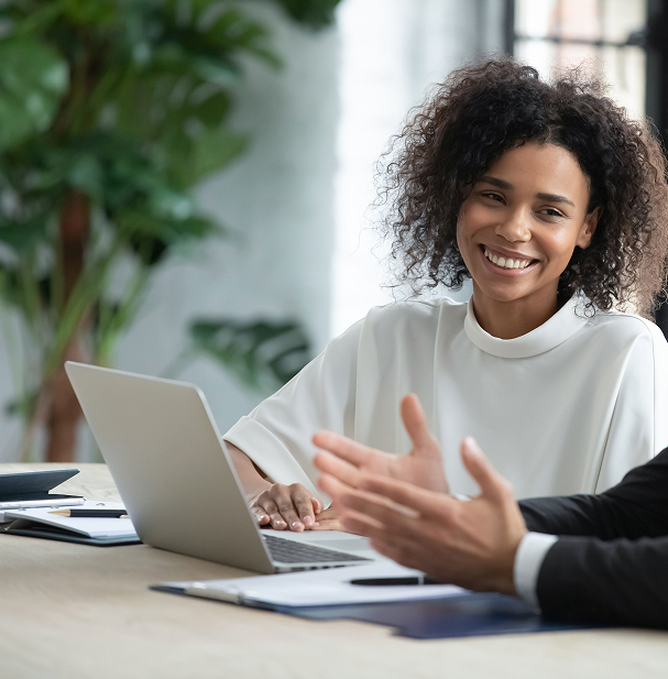Co-workers discussing in office image