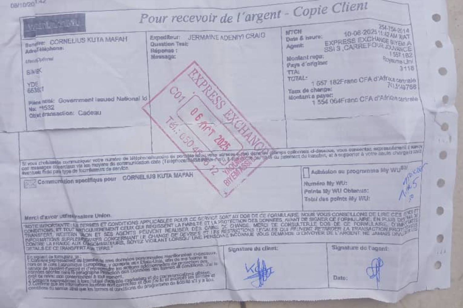 A printed money transfer receipt with stamps, signatures, and transaction details, featuring perforated edges.