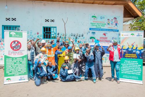 Trainees in work uniforms and hard hats gathered outside the Fesser and Friends Centre in Goma.