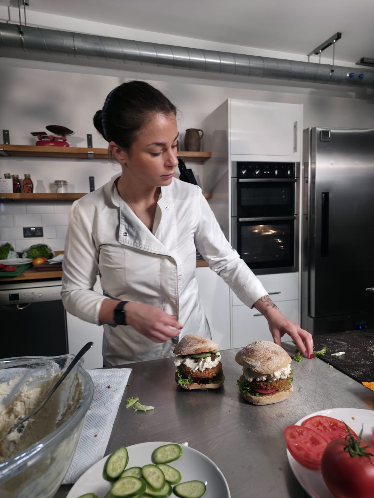 Chef building cluck burger