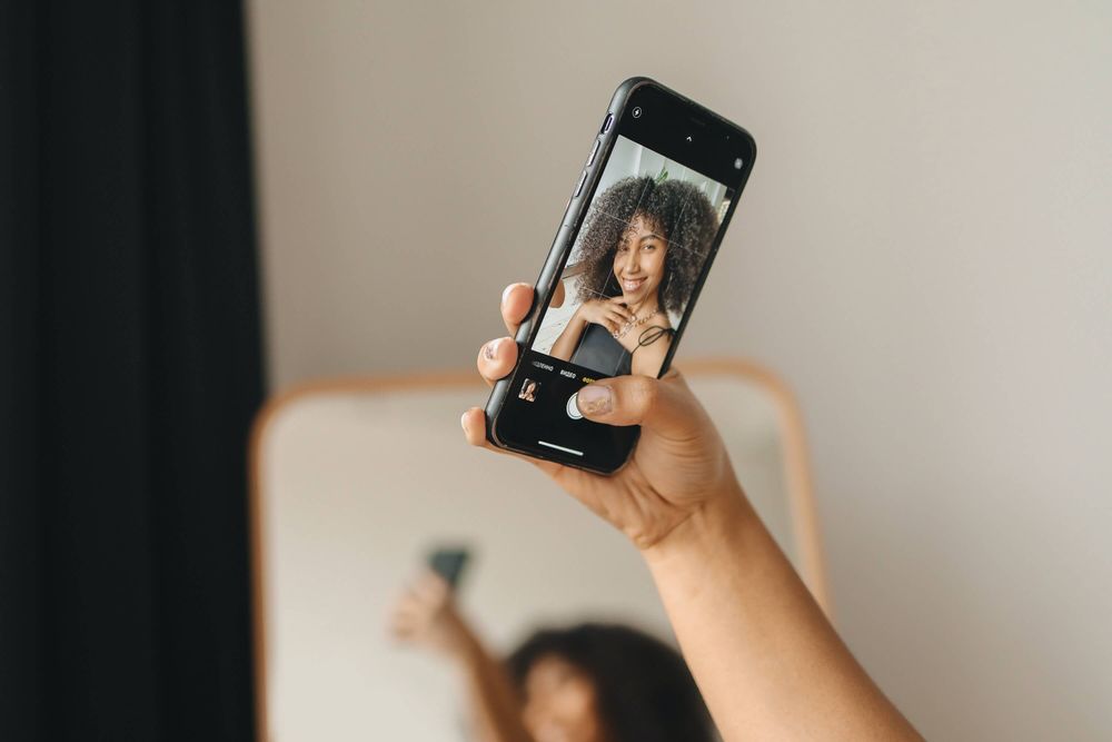 Girl takes a selfie on her cell phone