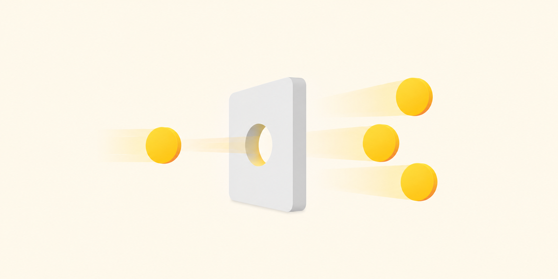 Yellow circles passing through a square hole in a white block against a light background.
