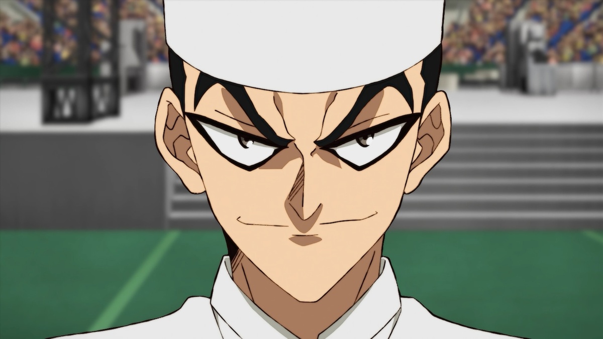 Jan Akiyama sports a wicked smile as he prepares to engage in a culinary competition in a scene from the upcoming Iron Wok Jan! TV anime.