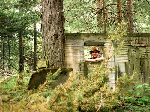 Woman in wooden hut