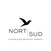 Black silhouette of a bird over the words "NORT | SUD" and "connecting decision makers" on a transparent background.