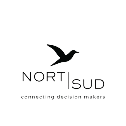 Black silhouette of a bird over the words "NORT | SUD" and "connecting decision makers" on a transparent background.